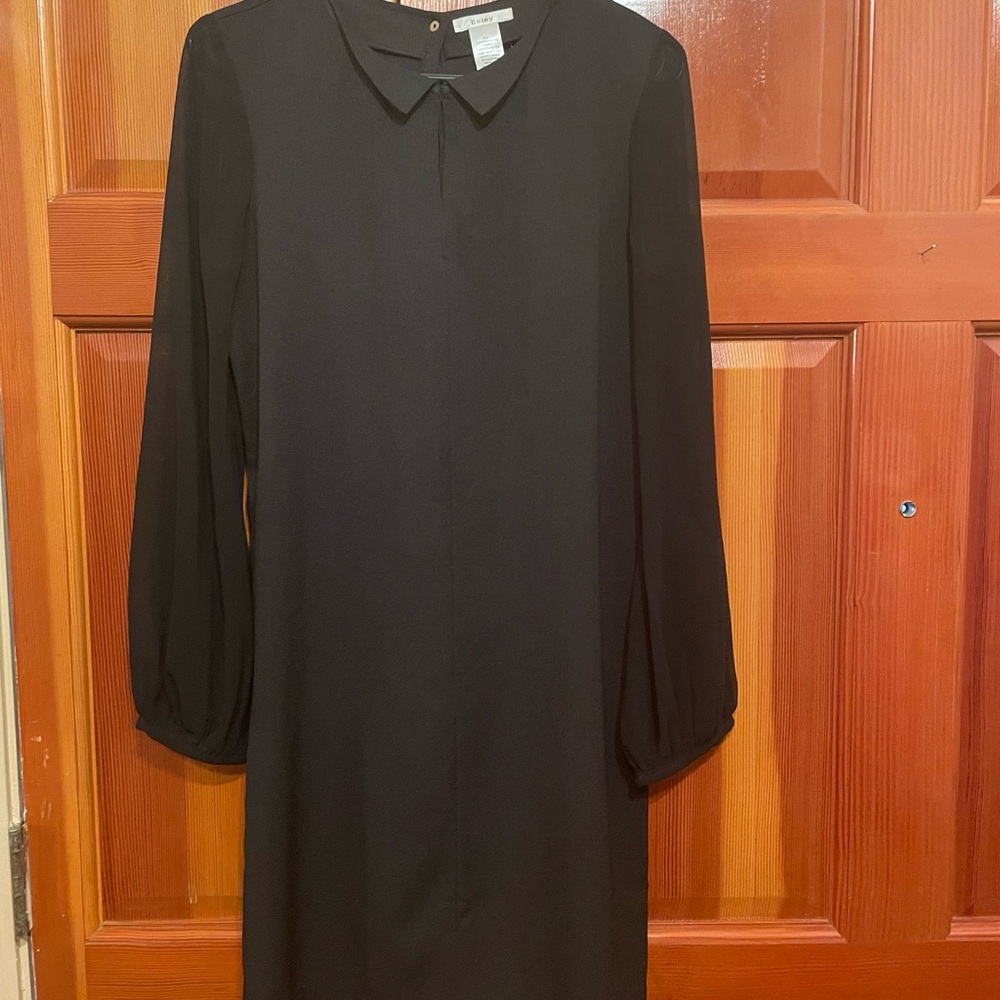 A long sleeve classic black dress